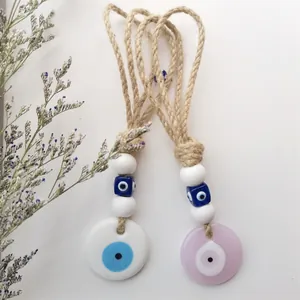 Handgemaakte Evil Eye wanddecoratie set met geweven jute touw en glazen kralen