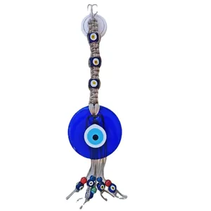 Decorazione da parete con Occhio di Allah in vetro blu e corda di canapa intrecciata