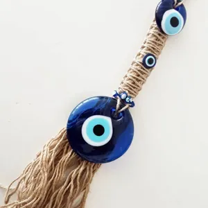 Turkish Blue Evil Eye glass pendant with natural jute rope and decorative tassels