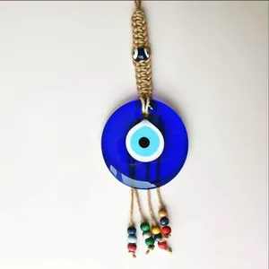 Pendaglio Evil Eye in vetro blu con perline colorate e corda di iuta intrecciata