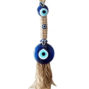 Blue glass evil eye wall hanging decor with jute rope weaving and bohemian tassels