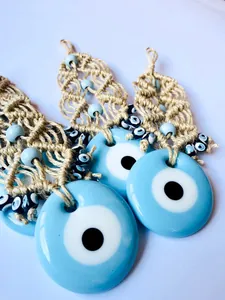 Decorazione da parete turca Evil Eye fatta a mano con corda di iuta e perline in vetro
