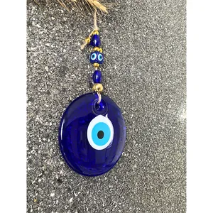 Large Turkish Evil Eye glass wall hanging with blue beads and jute rope home decoration