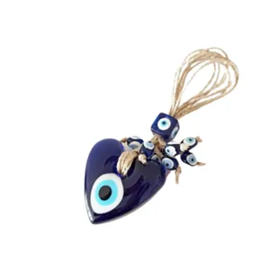 Ciondolo cuore malocchio turco in vetro blu con corda di canapa rustica e perline