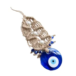 Handmade macrame Evil Eye wall hanging with blue glass pendant and white faux pearls