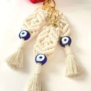 Handmade bohemian cotton tassels evil eye keychains with gold metal clasp in cream white