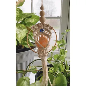 Handmade Bohemian wall hanging with evil eye, orange gemstone and white cotton tassels