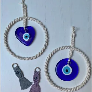 Decorazione da parete Evil Eye in cotone intrecciato a mano con ciondoli in vetro e nappe