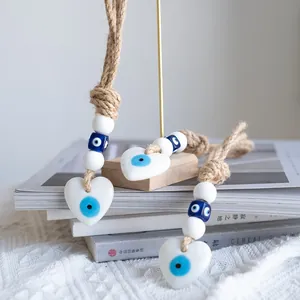 Three-piece heart-shaped evil eye wall hanging decor set with natural hemp rope