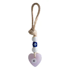 Handmade evil eye heart wall hanging decor with hemp rope and blue nazar beads
