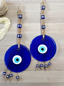Decorazione da parete con occhio di Allah in vetro blu e corda di iuta intrecciata