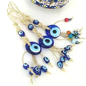Turkish Blue Evil Eye glass hanging decoration with woven hemp rope and colorful beads