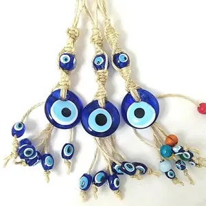 Handmade Turkish evil eye wall hanging decor with woven jute and glass beads