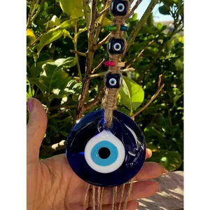 Decorazione da parete turca Malocchio con corda di iuta e perline tenuta a mano all'aperto