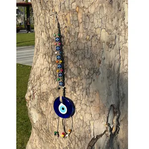 Decorazione da parete fatta a mano malocchio in stile boho con perline di vetro blu