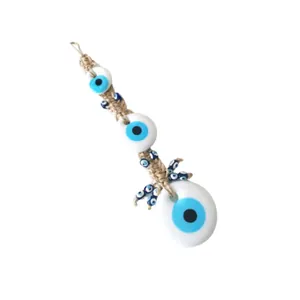 Traditional Evil Eye hanging ornament with blue glass beads and natural jute rope decor