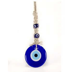 Bohemian handmade evil eye wall hanging with glass pendant and woven jute rope