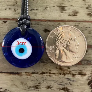 Pendentif œil porte-bonheur en verre bleu avec cordon noir, diamètre 3 cm
