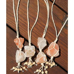 Handmade woven Himalayan salt stone pendants with natural crystal and cotton rope decor