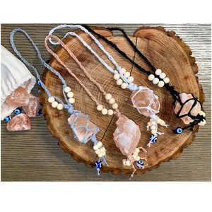 Handwoven salt stone hangers with evil eye beads and natural wooden bead accents