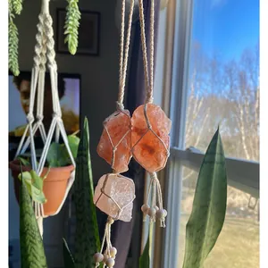 Handmade woven Himalayan salt stone wall hanging decor with bohemian cotton rope style