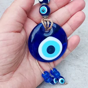 Pendaglio occhio di Allah in vetro blu con perla Nazar e corda di iuta fatta a mano