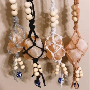Handwoven Himalayan salt stone hangers with cotton mesh and evil eye bead decor