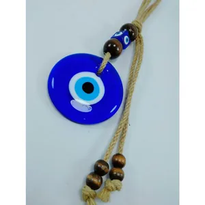 Turkish blue evil eye wall hanging with wooden beads and natural hemp rope decor
