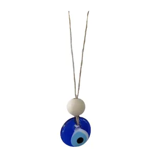 Blue glass evil eye pendant with wood bead and jute rope for wall or garden hanging
