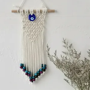 Bohemian handmade macrame evil eye wall hanging with cotton rope and blue beads