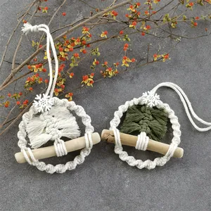 Handmade macrame Christmas tree ornaments with cotton fringe and wood accents