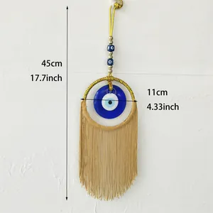 Décoration murale Evil Eye faite main avec glands dorés et perles bleues, 45cm de long