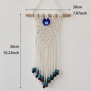 Bohemian evil eye woven tapestry wall decor with blue bead and cotton fringe accents
