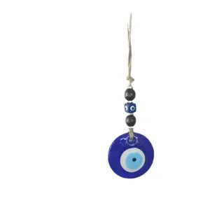 Decorazione da parete Malocchio fatta a mano con perla in vetro blu e corda di iuta
