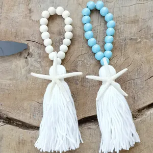 Handmade Mediterranean wood bead tassels with starfish charms for home or car decor