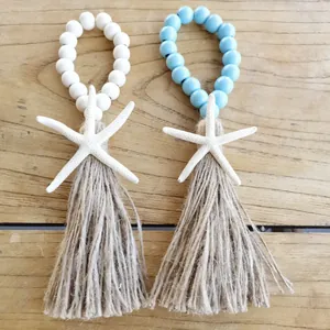 Coastal wooden bead tassel garland with white starfish decor for doors and tables