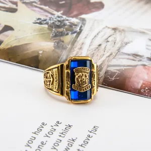 Detail of 1973 Walton Tigers vintage gold ring with blue stone and tiger head relief