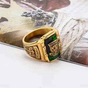 Vintage golden Walton Tigers ring with green rectangle gemstone and tiger relief