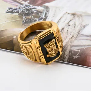 Macro detail of Walton Tigers gold champion ring with black stone and 1973 engraving