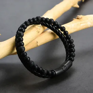 Bracciale da uomo a due file con perle in pietra lavica e cuoio intrecciato su legno