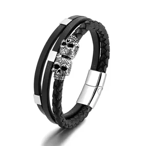 Men's punk multilayer braided leather bracelet with vintage silver skulls and magnetic clasp