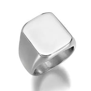 Polished gold stainless steel signet ring with a minimalist flat top surface