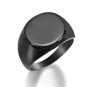 Minimalist matte black stainless steel signet ring with a brushed metal finish for men