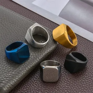 Detailed set of five men's square signet rings in matte blue, silver, gold, and black finishes