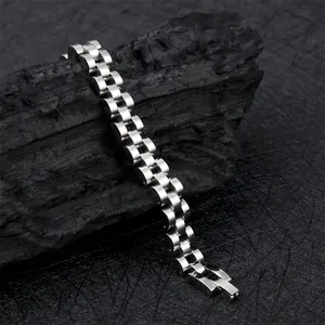 Polished silver stainless steel watch-style link bracelet with folding clasp detail