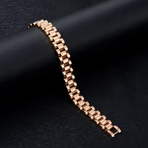 Rose gold stainless steel watch band style bracelet displayed on a black stand