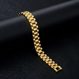 Detailed shot of a gold-plated stainless steel watch-style bracelet with a folding clasp