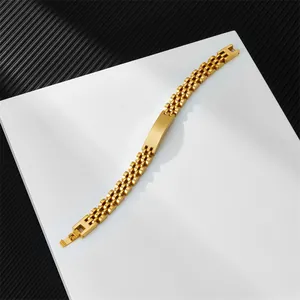Close-up of golden 10mm stainless steel watchband bracelet with engravable metal plate