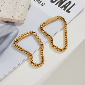 Minimalist gold stainless steel bracelets with unique cylindrical mechanical clasps
