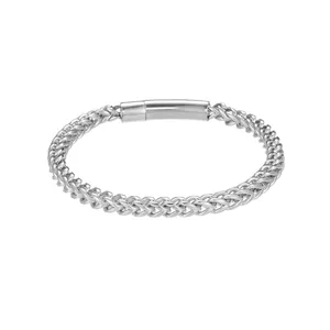 Detailed view of silver stainless steel spiga wheat chain bracelet with clasp